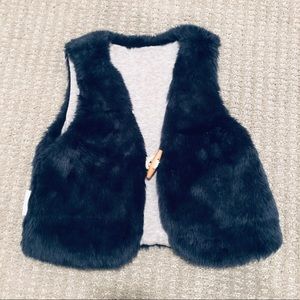 Girls’ reversible faux fur vest